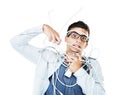 Portrait of man in glasses tangled in wire, cables and isolated on a white background. Face of serious geek wrapped in Royalty Free Stock Photo