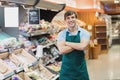 Portrait of man grocer smiling