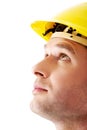 Portrait of a man with hardhat looking up