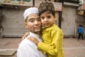 Portrait of the man with his son who came to Pray on Eid, India, Delhi, close-up
