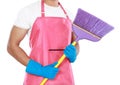 Portrait of man holding broom Royalty Free Stock Photo