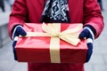 Midsection of man holding gift box winter Royalty Free Stock Photo