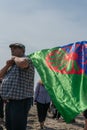 portrait of a man holding the gypsy flag Royalty Free Stock Photo