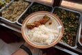 Portrait of man holds a plate of rice Royalty Free Stock Photo