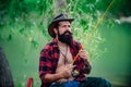 Portrait man on holiday. Fisherman fishing equipment. Set up rod with hook line sinker. Bearded elegant man. Mature man Royalty Free Stock Photo