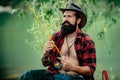 Portrait man on holiday. Fisherman fishing equipment. Set up rod with hook line sinker. Bearded elegant man. Mature man Royalty Free Stock Photo