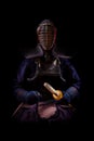 Portrait of man kendo fighter with bokuto