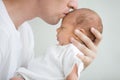 Portrait of man kissing his baby Royalty Free Stock Photo