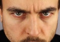 Portrait of a man, menacing look, closeup Royalty Free Stock Photo