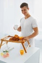 Portrait of man in the morning. Romantic breakfast