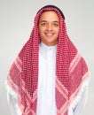 Portrait, man and muslim with Arabic scarf, smile and happy isolated against white background. Faith, Islam with Islamic