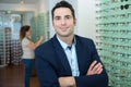 portrait man in optics store Royalty Free Stock Photo