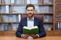 Portrait of a man, a pastor of a church, a religious community of various denominations, giving his sermon online Royalty Free Stock Photo