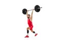 Portrait of man in red sportswear exercising with a weight isolated on white background. Sport, weightlifting, power