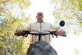 Portrait of man riding cycle in countryside Royalty Free Stock Photo