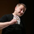 Portrait of the man with royal flush