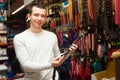Portrait of man selecting collars Royalty Free Stock Photo