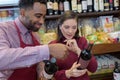 Portrait man selling wine during wine tasting