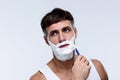 Portrait of a man shaving Royalty Free Stock Photo