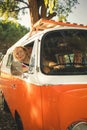 Portrait of man sitting in camper van