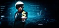 Portrait of a man in a suit and helmet. He put out a palm in which an electric charge and a dollar sign. Business concept