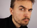 Portrait of a man, suspicious look, closeup Royalty Free Stock Photo