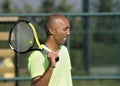 Portrait of a man with tennis racket Royalty Free Stock Photo