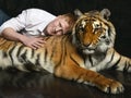 Portrait of man with tiger