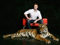 Portrait of man with tiger