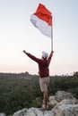 Asian male with indonesian flag celebrating independence day Royalty Free Stock Photo