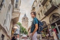 Portrait of man tourist with view of Galata tower in Beyoglu, Istanbul, Turkey. Turkiye