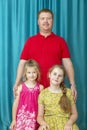 portrait of a man with two blonde daughters Royalty Free Stock Photo