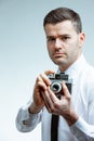 Portrait of a man with vintage camera Royalty Free Stock Photo