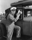 Portrait of man washing car windows Royalty Free Stock Photo