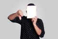 Young Asian Man Covering His Face With Small Whiteboard Royalty Free Stock Photo