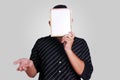 Young Asian Man Covering His Face With Small Whiteboard Royalty Free Stock Photo