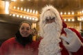 portrait of man wearing a santa claus costume at the mulled wine cabin at the christmas Royalty Free Stock Photo