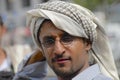 Portrait of a man wearing traditional head scarf in Taizz, Yemen.