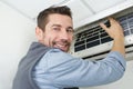 Portrait man working on air-conditioned system