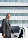 Portrait Of Man Working As Driver In White Limousine Royalty Free Stock Photo