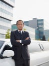 Portrait Of Man Working As Driver In White Limousine Royalty Free Stock Photo