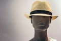 Portrait of mannequin head in hat. Woman face in store window.  bald dummy. Shopping, beauty or feminine concept Royalty Free Stock Photo