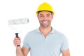 Portrait of manual worker holding paint roller Royalty Free Stock Photo