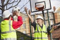 Photo of Manual workers playing basketball