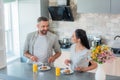 portrait of married couple having breakfast together