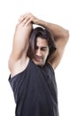 Portrait of masculine guy flexing his muscles