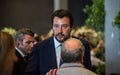 Portrait of Matteo Slavini in a suit meeting with civilians Royalty Free Stock Photo