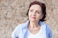 Portrait of a mature attractive stylish woman retired and outdoo Royalty Free Stock Photo
