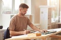 Male Architect Working at Drawing Desk Royalty Free Stock Photo