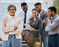 Leading her team towards greatness. Portrait of a mature businesswoman standing with her arms crossed in an office with Royalty Free Stock Photo